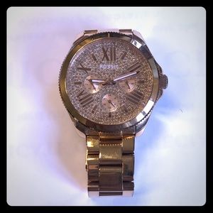 Fossil Cecile multifunction rose gold watch.